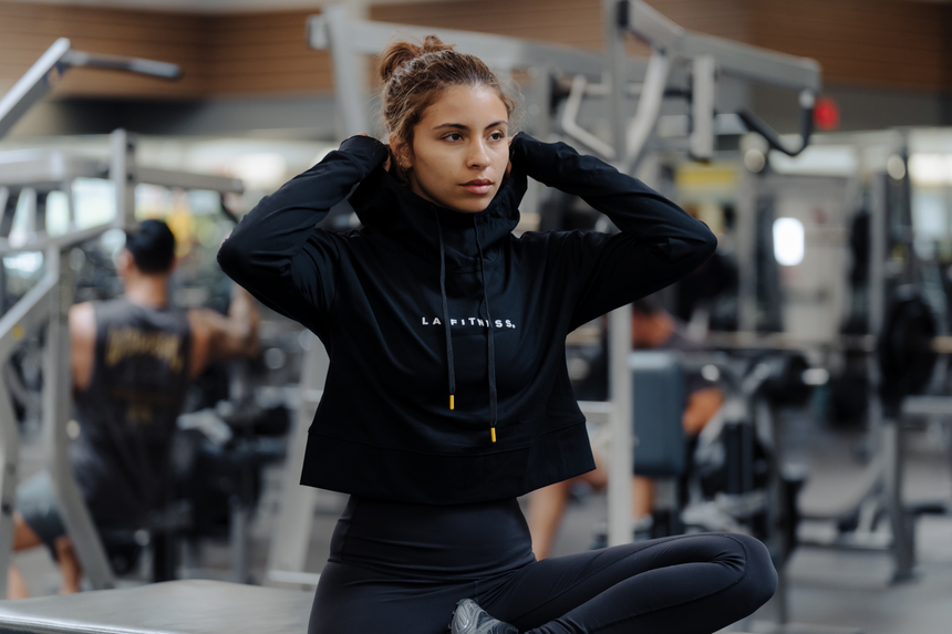 Ladies Black Cowl Neck Hoodie with white "LA | Fitness" text on front